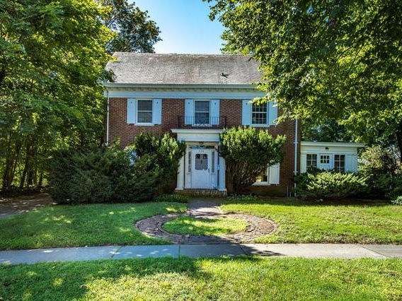 outside of 5 bedroom brick & slate home for sale at maltz auctions