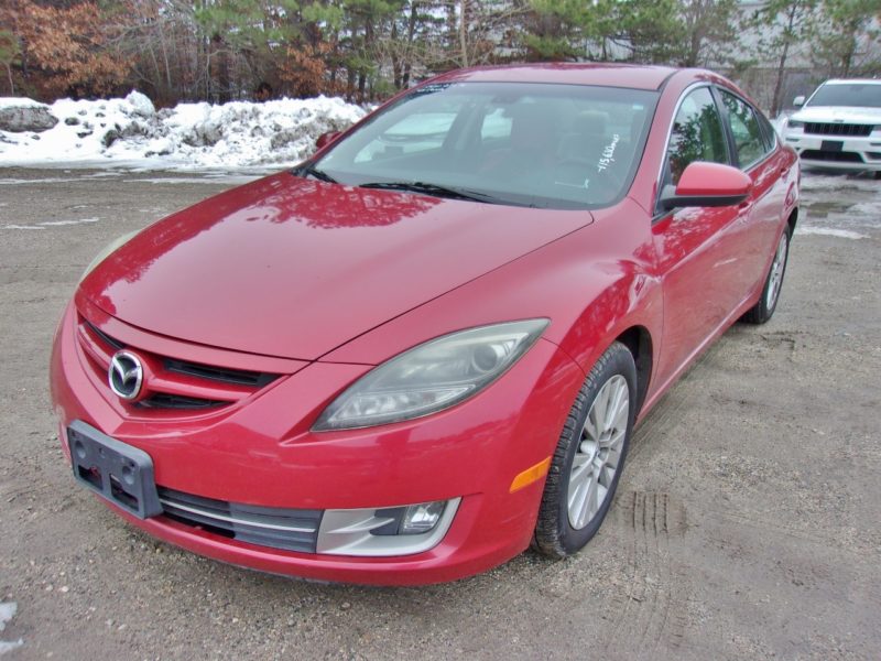 red vehicle for sale at maltz auto auctions