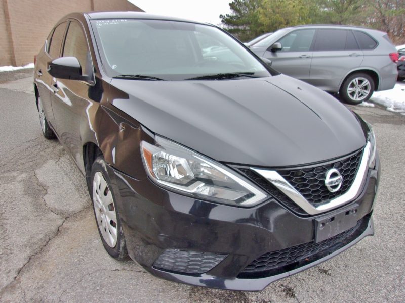 black nissan vehicle for sale at maltz auto auctions