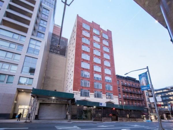 outside of 65,000 sq foot building for sale at maltz auctions