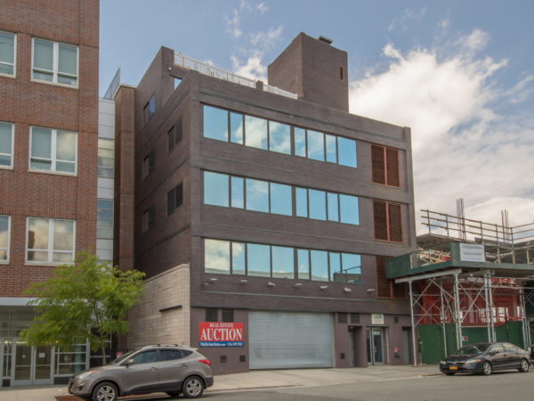 outside of 20,000 square foot building for sale by maltz auctions