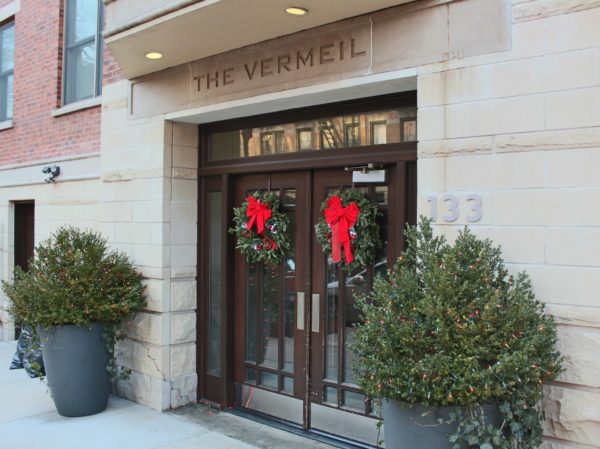 outside of luxury duplex condo front doors - building for sale by auction