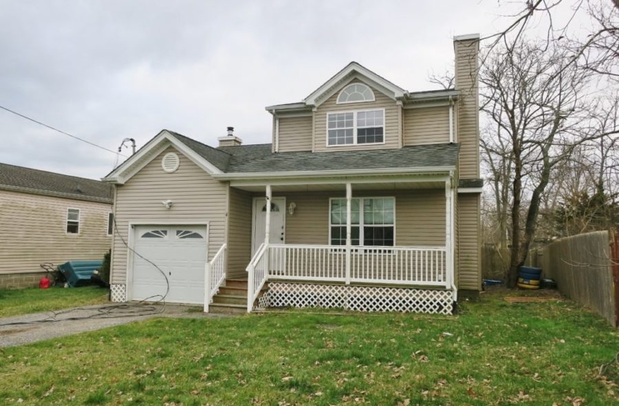 outside of single family home for sale at maltz auctions in new york city