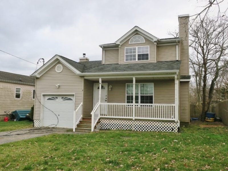 outside of single family home for sale at maltz auctions in new york city