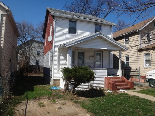 exterior of small home for sale by maltz auctions in new york city