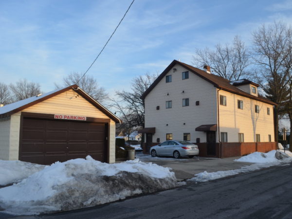side view of of private home for sale at Maltz Auctions