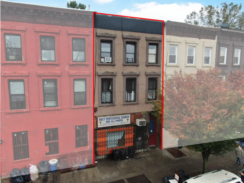 exterior of mixed use building for sale by maltz auctions