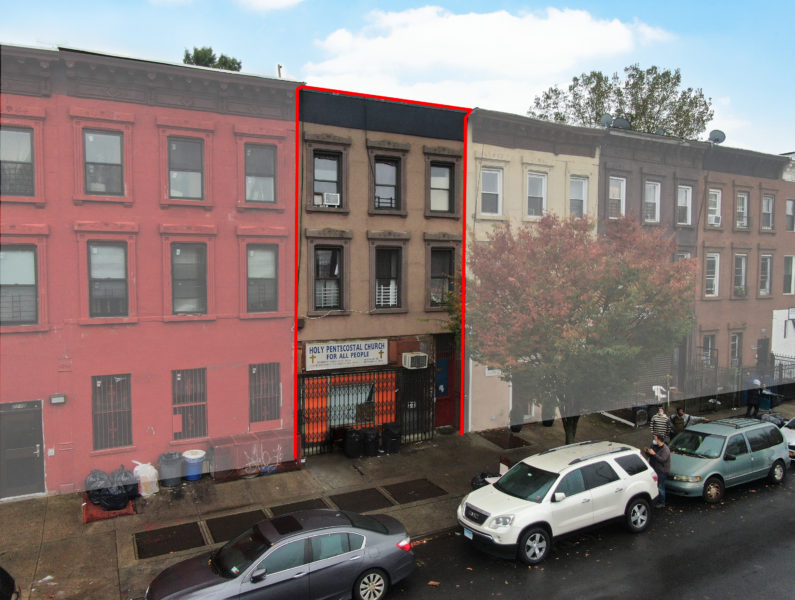 exterior of mixed use building for sale by maltz auctions