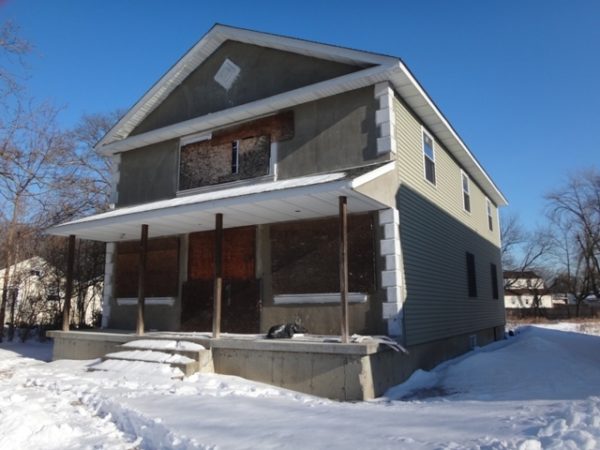 exterior of home for sale at maltz auctions in new york city