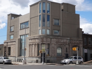 exterior of commercial building for sale at maltz auctions in new york city