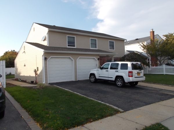 exterior of home for sale at maltz auctions