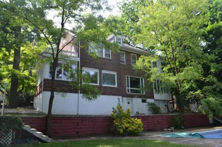 exterior of home for sale at maltz auctions in new york