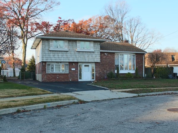 front of private home for sale at maltz auctions in new york city