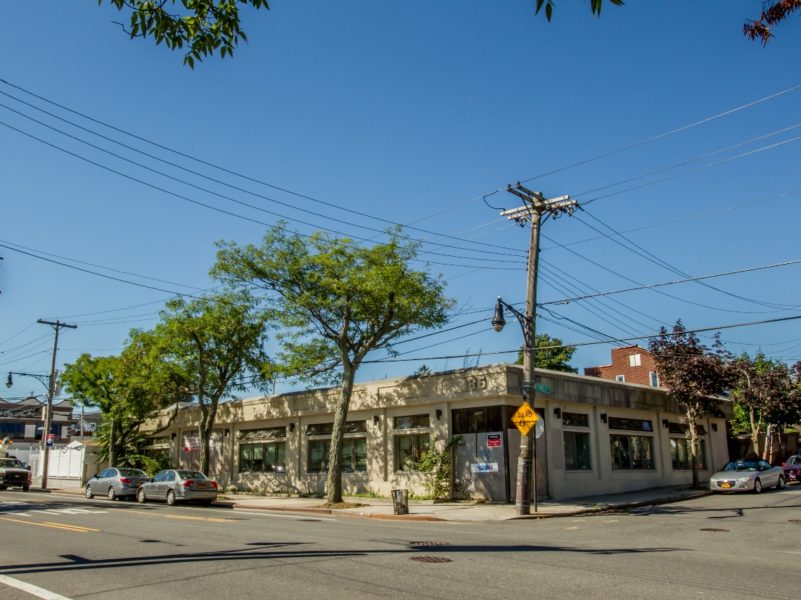 corner building up for sale at maltz auctions in new york city