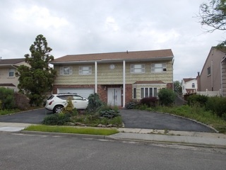 home near water for sale at maltz auctions in new york city