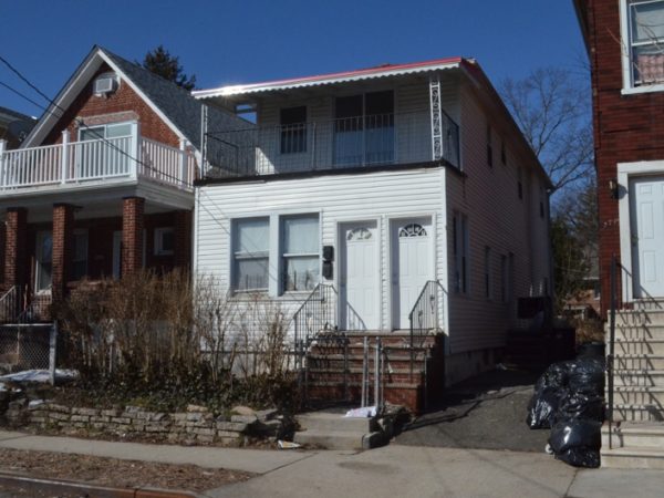 exterior of home for sale at maltz auctions in new york city