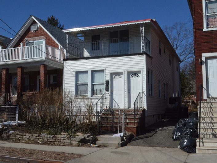 exterior of home for sale at maltz auctions in new york city
