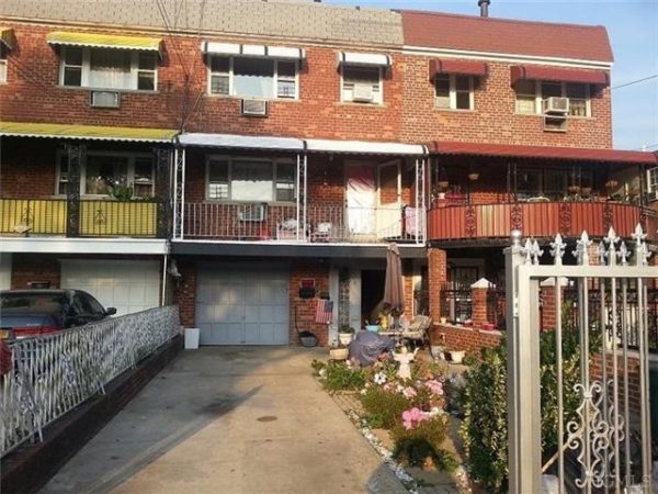 exterior of two family home for sale by maltz auctions in new york