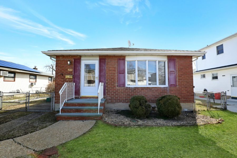 exterior of home for sale at maltz auctions in new york