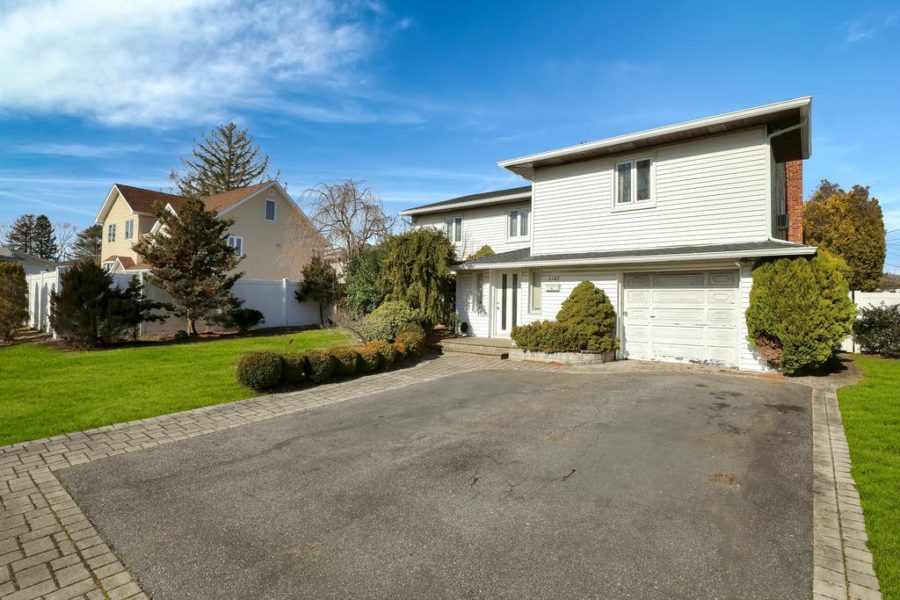 front exterior of home for sale at maltz auctions in new york
