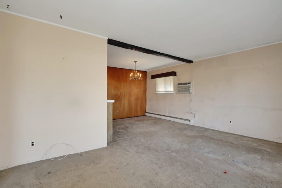 living area of home for sale at maltz auctions in new york