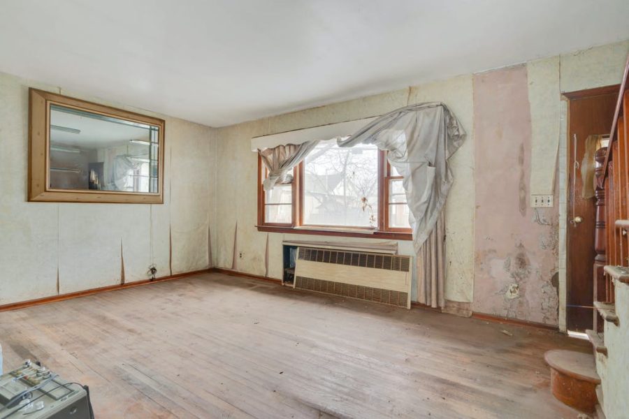 living room area of home for sale at maltz auctions in new york