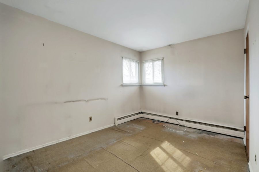 living room area of home for sale at maltz auctions in new york