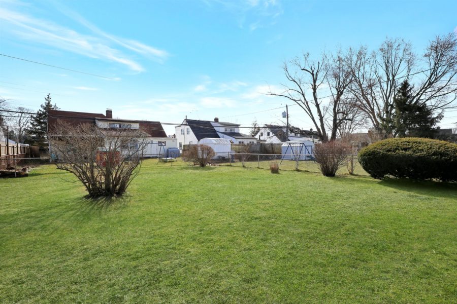 backyard of home for sale at maltz auctions in new york