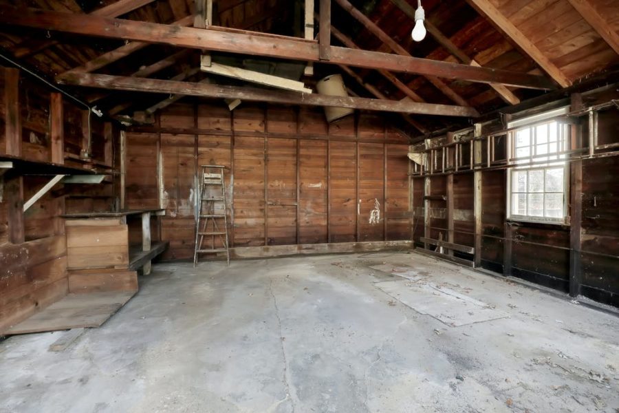 interior of detached garage of home for sale at maltz auctions in new york