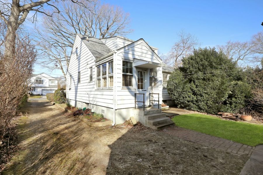 back exterior of home for sale at maltz auctions in new york