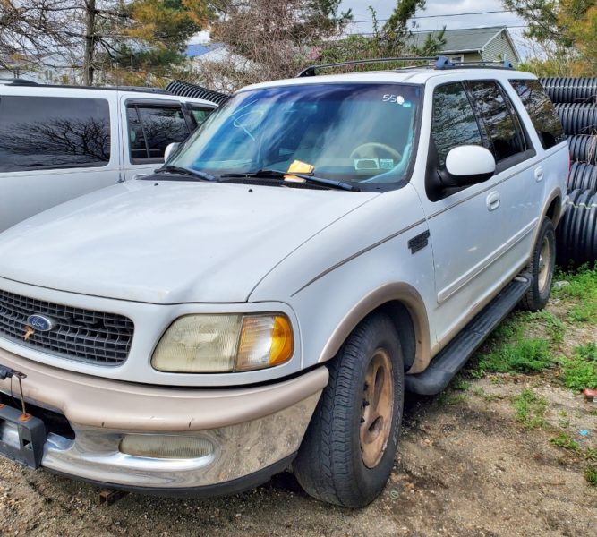white ford car for sale at maltz auto auctions