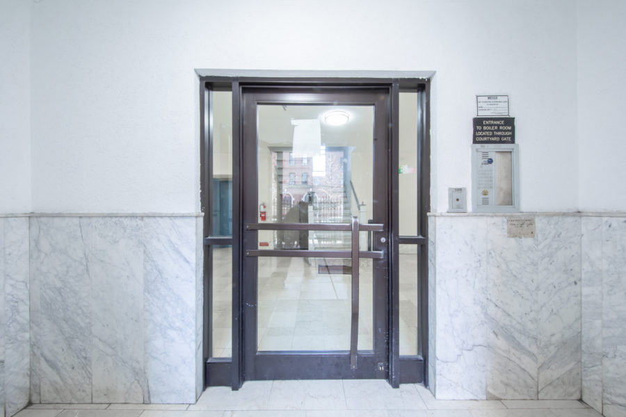 entryway of duplex condo for sale at maltz auctions in new york