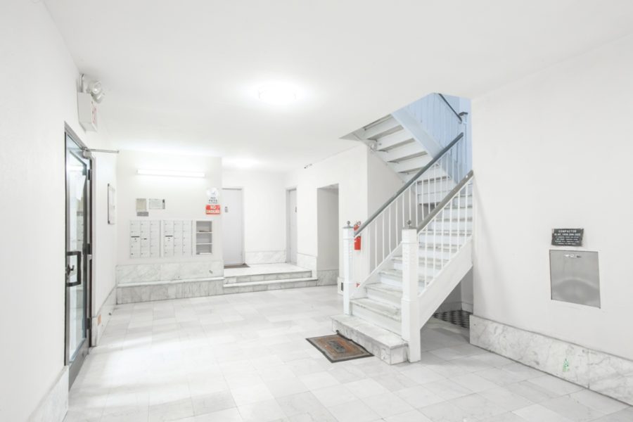 entryway of duplex condo for sale at maltz auctions in new york