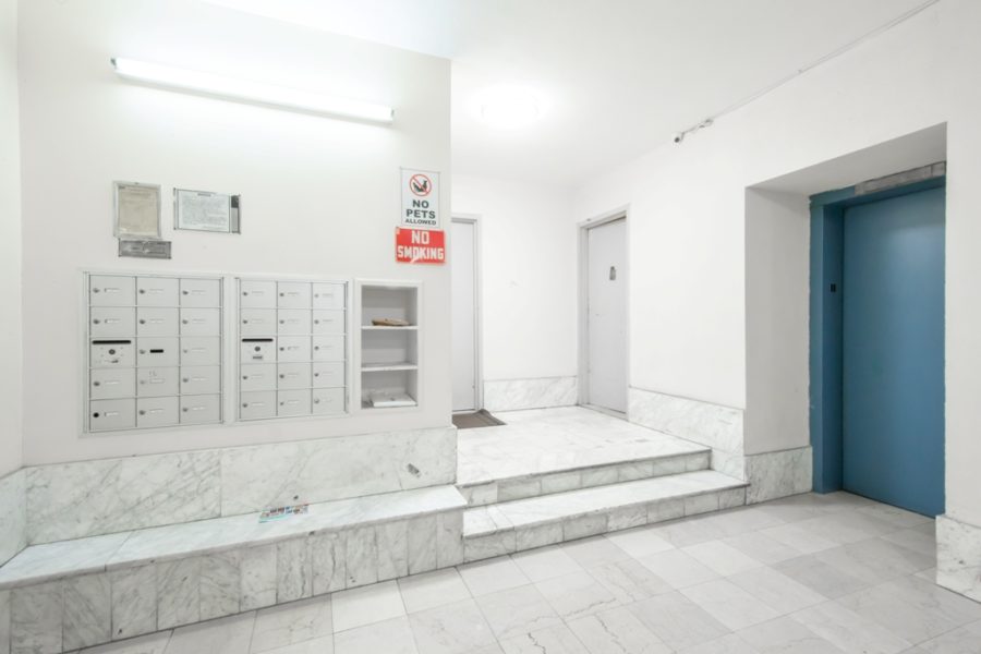 entryway of duplex condo for sale at maltz auctions in new york