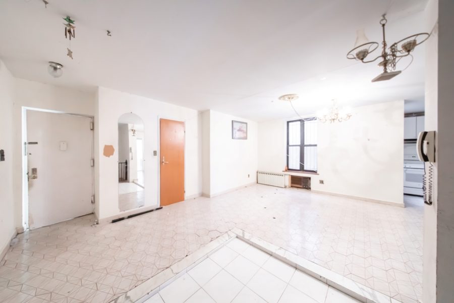 living area of duplex condo for sale at maltz auctions in new york