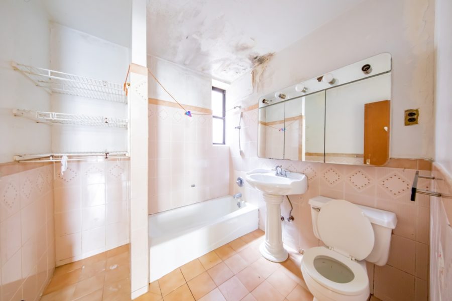 bathroom of duplex condo for sale at maltz auctions in new york