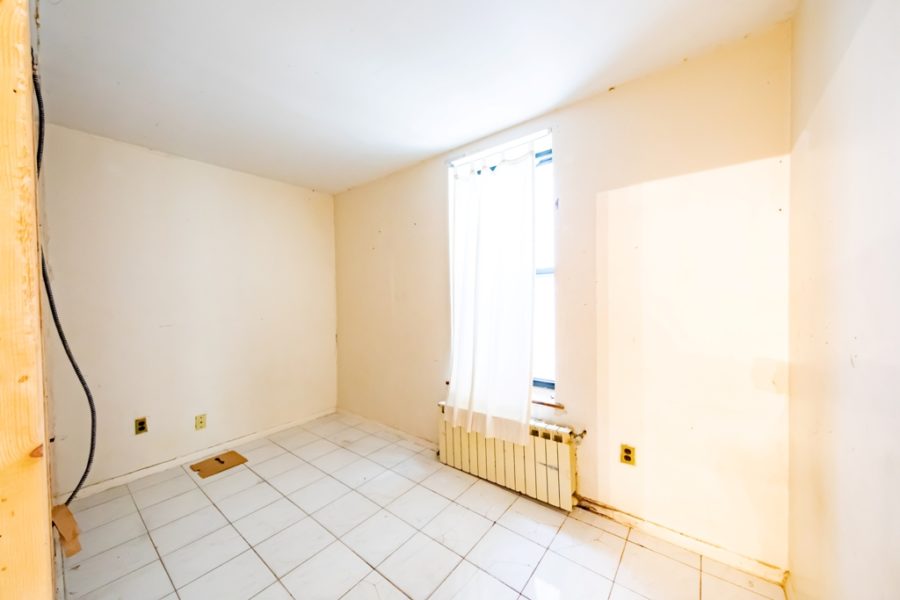 room of duplex condo for sale at maltz auctions in new york