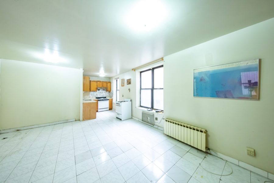 living area of duplex condo for sale at maltz auctions in new york