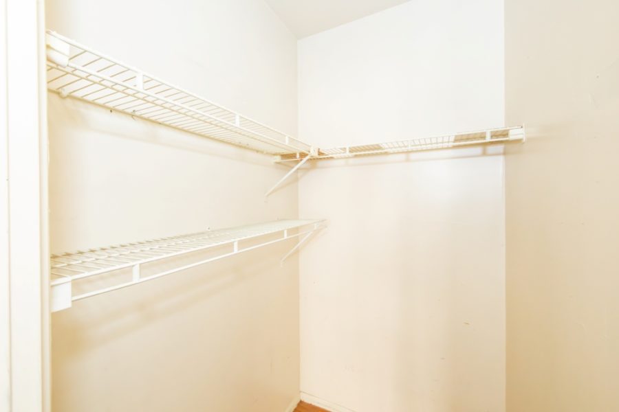 closet of duplex condo for sale at maltz auctions in new york