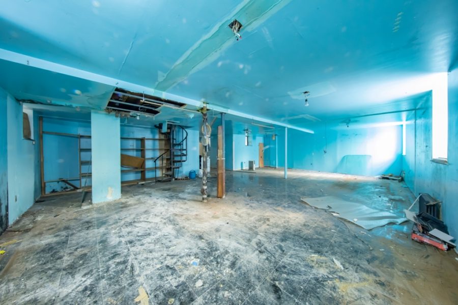 unfinished basement of duplex condo for sale at maltz auctions in new york