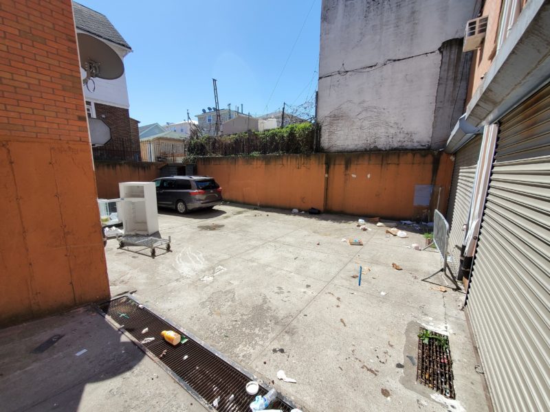 parking lot of buildings for sale at maltz auctions in new york