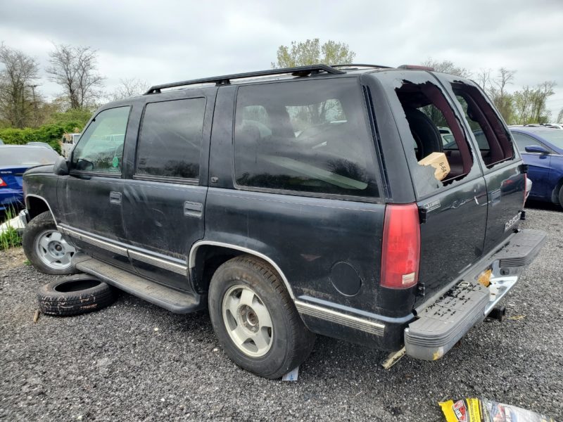 damaged black vehicle for sale at maltz auto auctions in new york