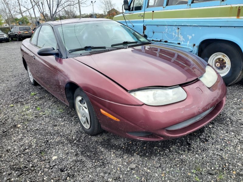 red vehicle for sale at maltz auto auctions in new york