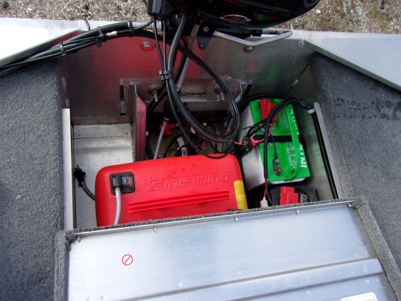 engine and battery compartment on boat for sale by maltz auctions