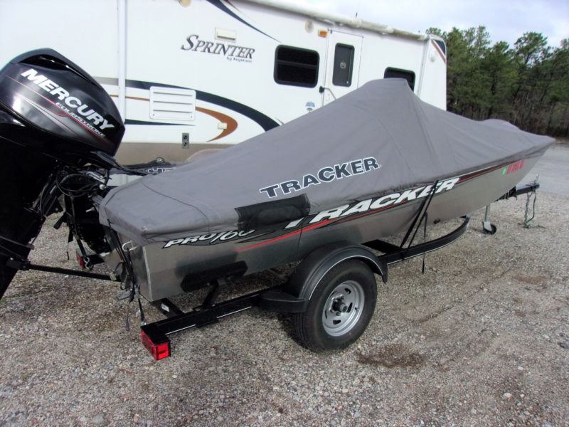 side of fishing boat with cover on it for sale by maltz auctions in new york