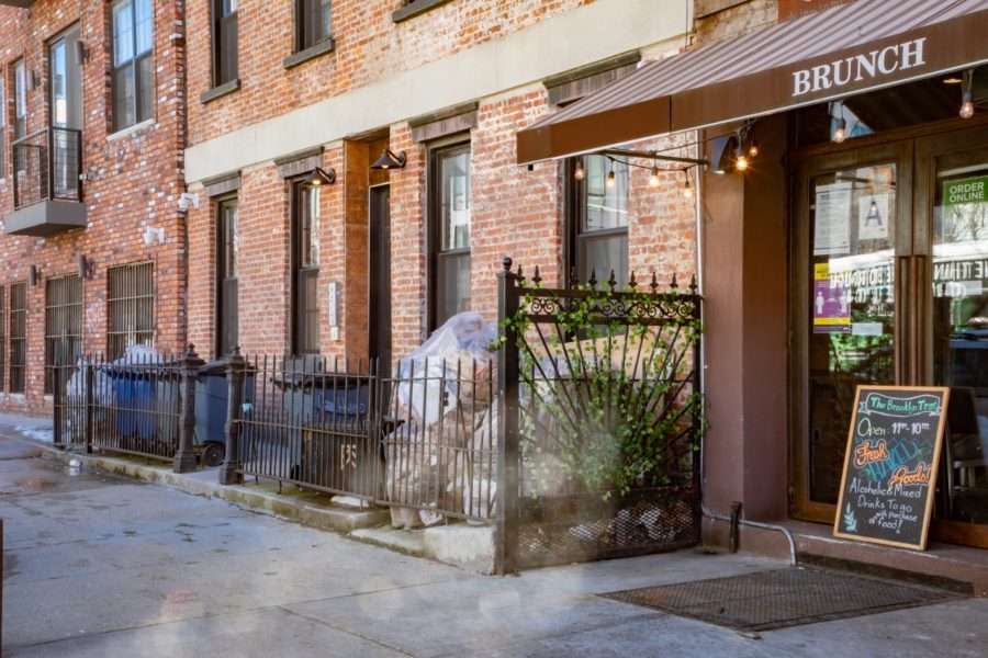 outside of multi-family building up for auction at maltz auctions in new york