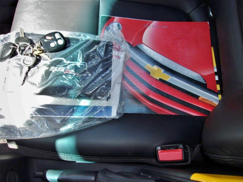 chevy vehicle information and keys on passengers seat
