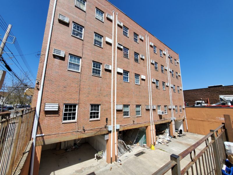 outside of 4 buildings for sale by maltz auctions