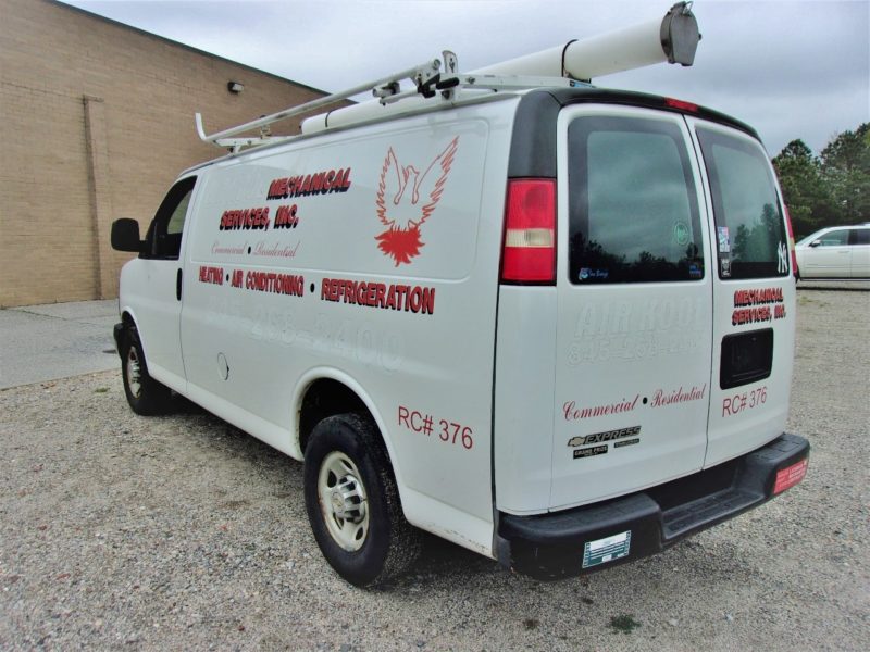 back of white van for sale at maltz auto auctions