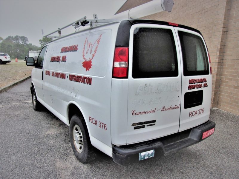 back of white van for sale at maltz auto auctions
